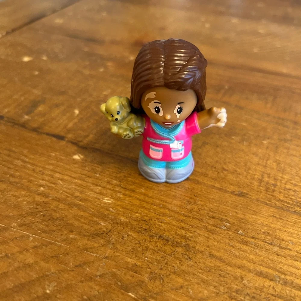 Fisher Price Little People Barbie’s friend with melasma as is